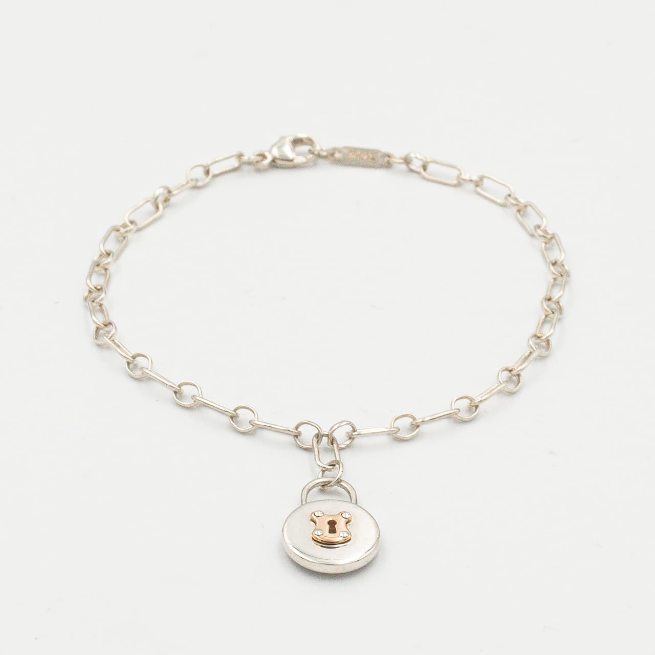 ティファニー ラウンド ロック チャーム ブレスレット 18.2cm シルバー 18K コンビ