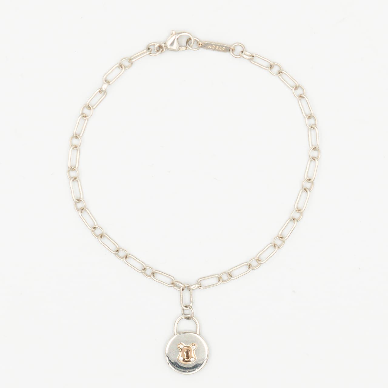 ティファニー ラウンド ロック チャーム ブレスレット 18.2cm シルバー 18K コンビ