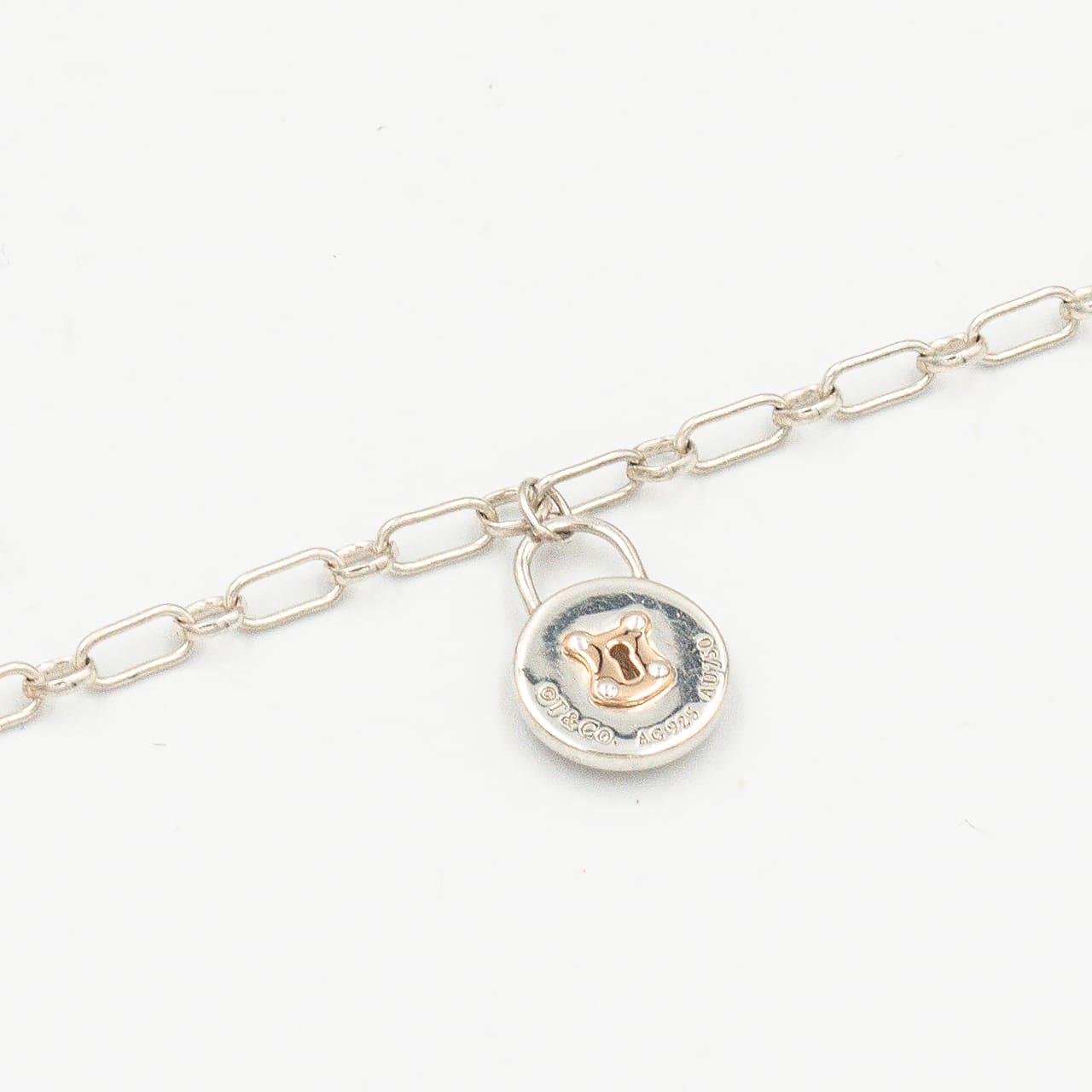 ティファニー ラウンド ロック チャーム ブレスレット 18.2cm シルバー 18K コンビ