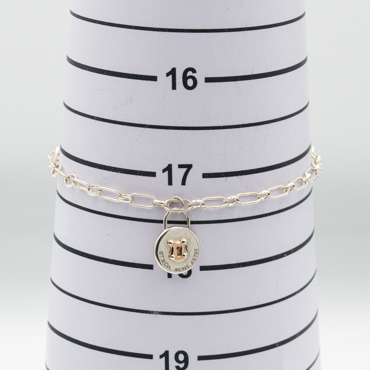 ティファニー ラウンド ロック チャーム ブレスレット 18.2cm シルバー 18K コンビ